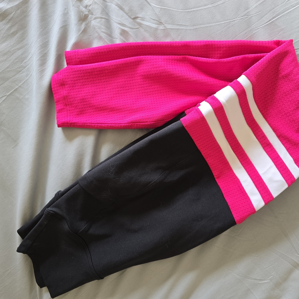 Bombshell Sportswear Pink and Black Leggings with Bold Stripes